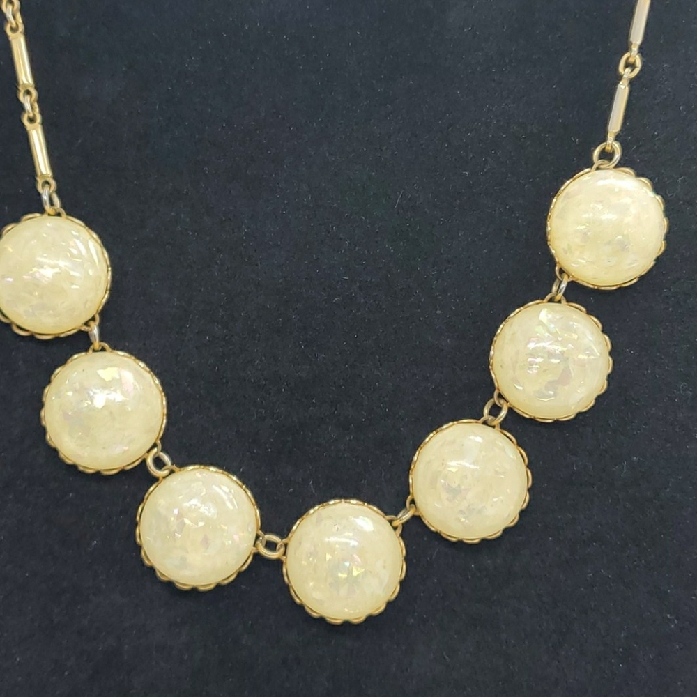 Yellow glittery half disc long link gold tone neck
